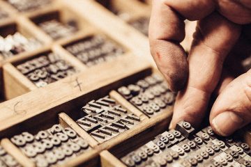 Artisan composing movable type for Letterpress Printing.
